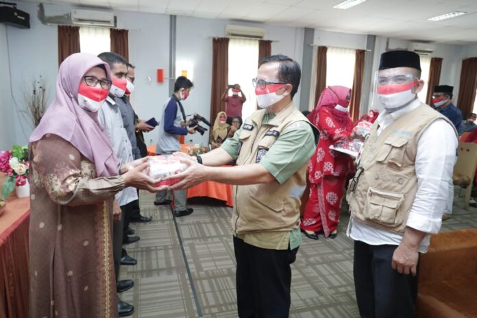 110 Ribu Masker Merah Putih Disebarkan untuk 17 SMK di Aceh